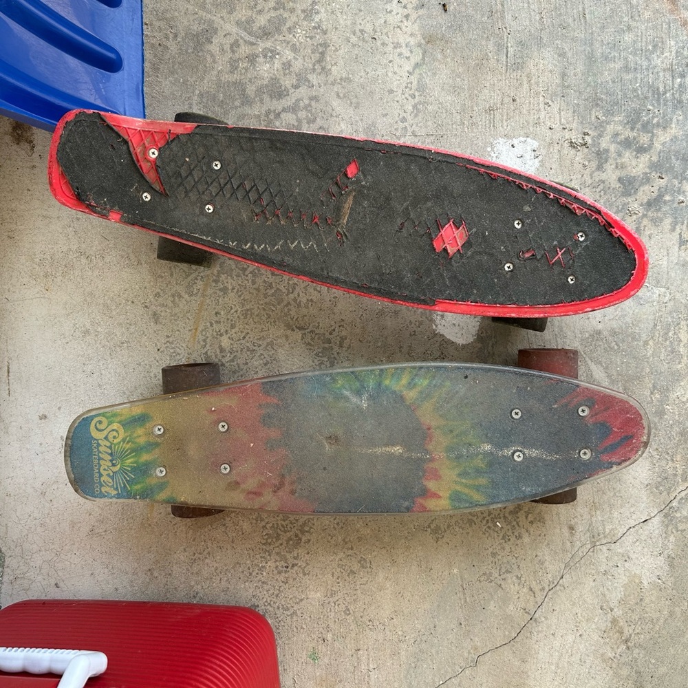 Vintage Skateboards with Red and Multicolor Designs